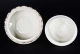 KPM (1831-1971),  - Duas peças de porcelana KPM, sendo uma potiche de porcelana alemã na cor bege com flores em policromia e friso dourado e prato de porcelana polonesa n