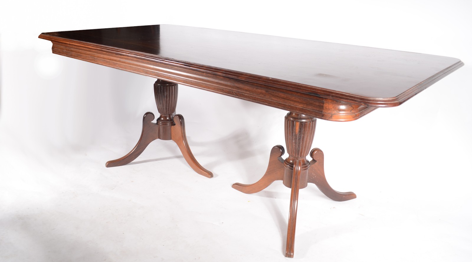 Mesa de jantar de jacarandá, tampo retangular apoiado em bases com... - foto 1 de 4