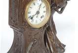 Ansonia Clock Company (1851-2006),  - Relógio americano de mesa de petit bronze, com pátina marrom, estilo ART NOUVEAU. Peça representando figura feminina. Decoração representado garça, fl