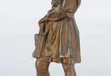 Estatueta russa de bronze representando menina ... - Estatueta russa de bronze representando menina com pasta escolar.