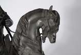 Emile Coriolan H. Guillemin (1841/1907) - D'apr... - Grupo escultórico de petit bronze patinado representando "Guerrier touareg à cheval", base de mármore rajado. Assinada.