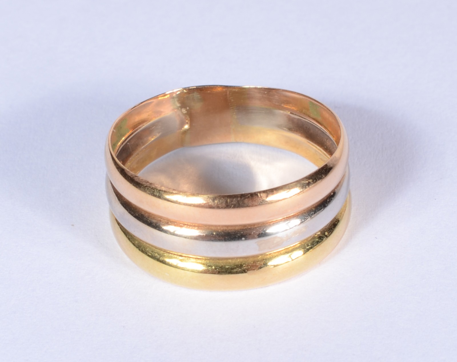 Anel de ouro 18 k., com 3 aros. Aro 21. (Por motivos de segurança a... - foto 1 de 5