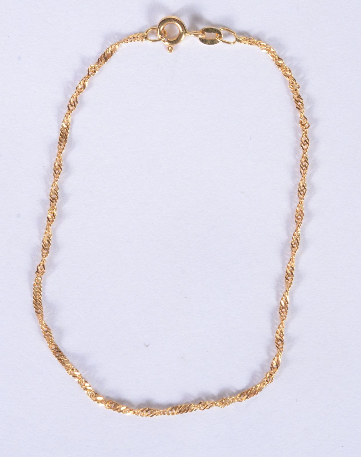 Pulseira de malha torcida de ouro 18 k., contraste 750 mls. (Por... - foto 1 de 3
