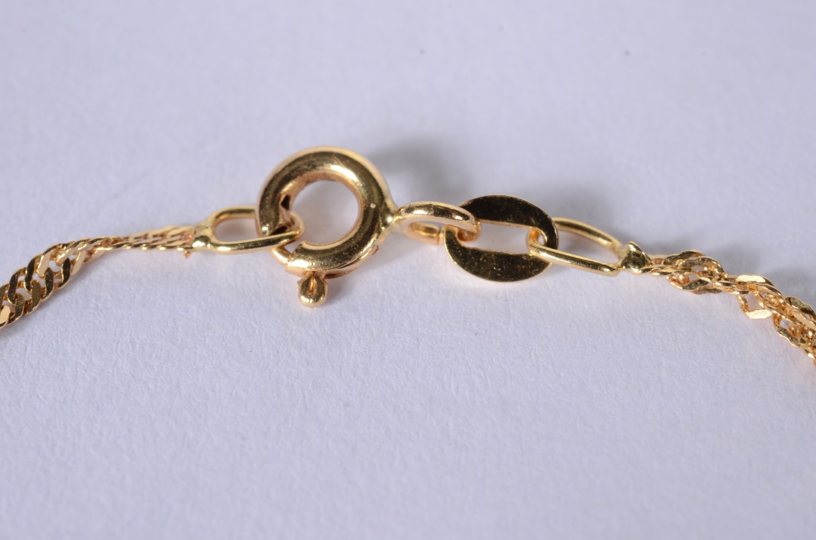 Pulseira de malha torcida de ouro 18 k., contraste 750 mls. (Por... - foto 2 de 3