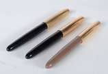 PARKER,  - Três canetas Parker americanas com tampas folheadas á ouro.