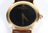 Baume & Mercier (1830),  - Relógio de pulso, caixa de ouro 18k., pulseira de couro.