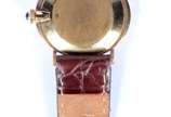 Baume & Mercier (1830),  - Relógio de pulso, caixa de ouro 18k., pulseira de couro.
