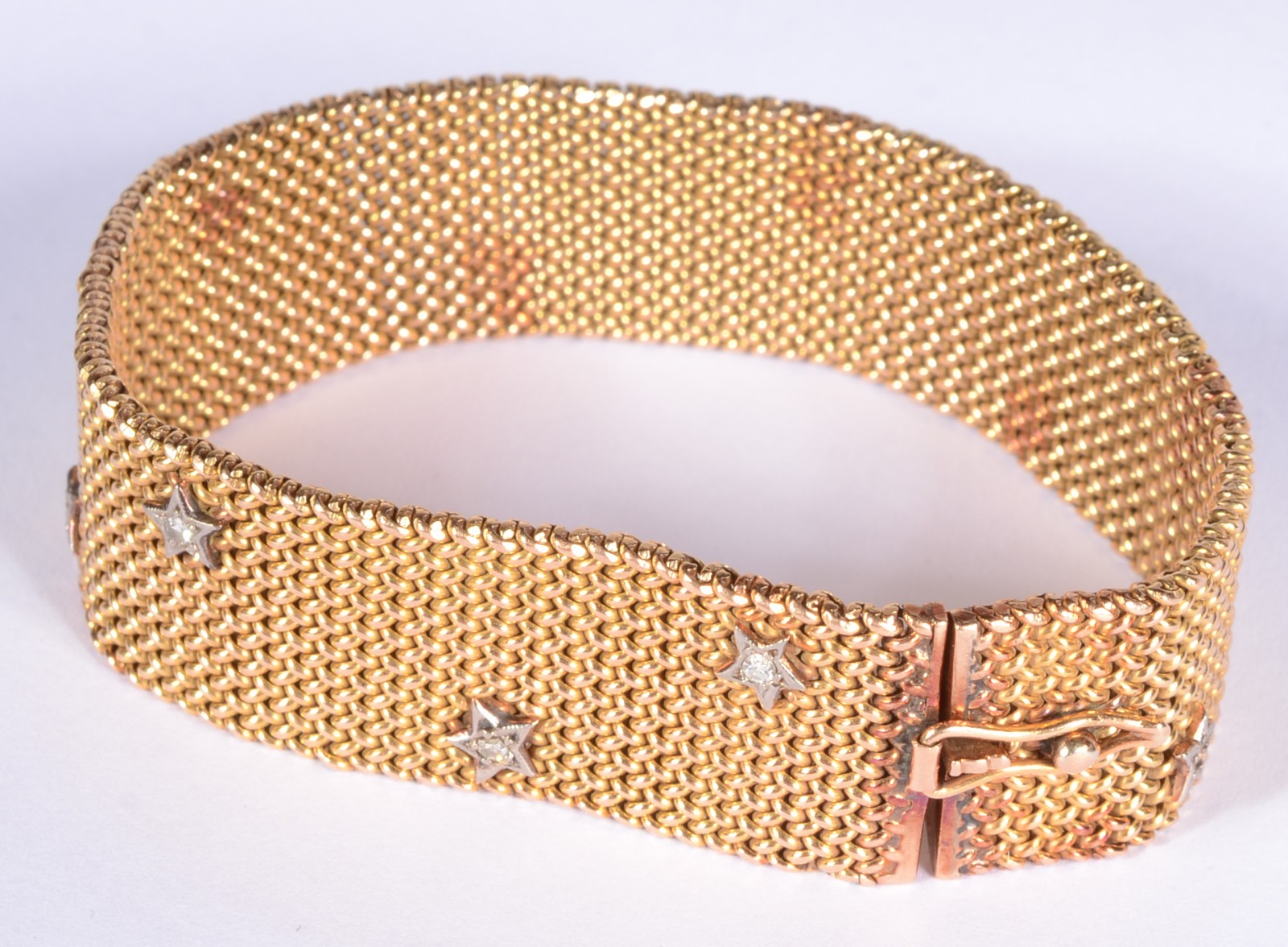 Pulseira de ouro 18 k., decorada com estrelas e brilhantes. (Por... - foto 2 de 6