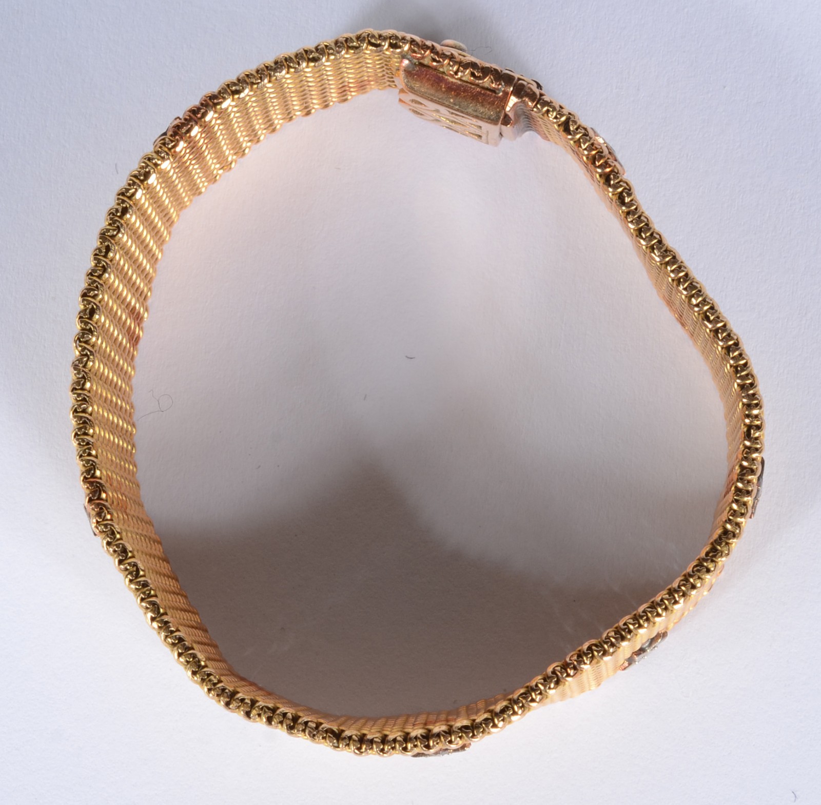 Pulseira de ouro 18 k., decorada com estrelas e brilhantes. (Por... - foto 5 de 6