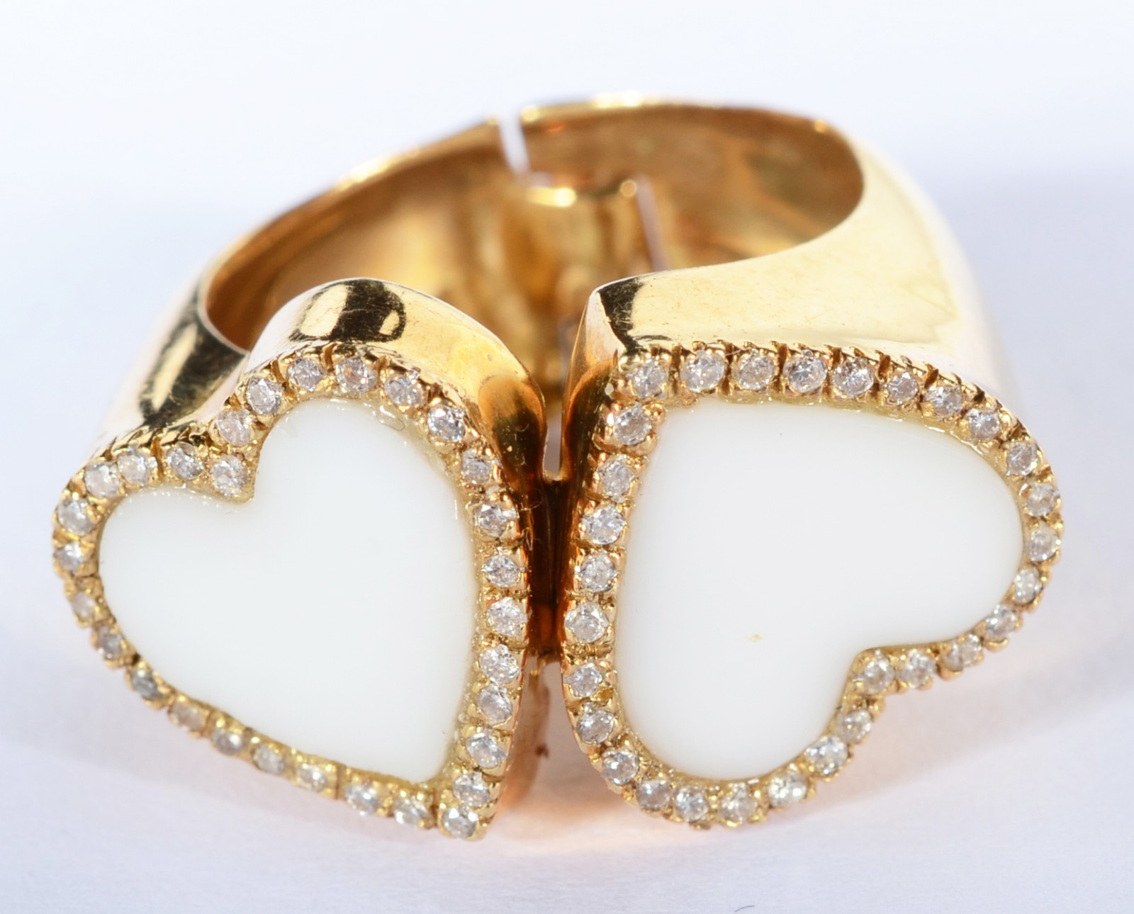 Anel de ouro 18 k., contraste 750 mls com dois corações com... - foto 1 de 6