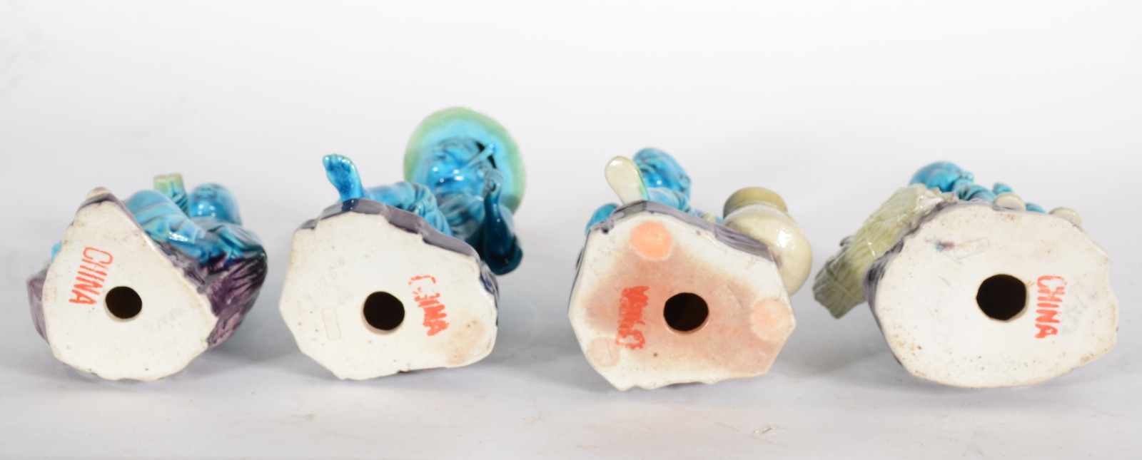 Quatro figuras típicas de porcelana oriental azul turquesa. Um deles... - foto 5 de 7