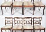 Conjunto com 8 cadeiras para sala de jantar de ... - Conjunto com 8 cadeiras para sala de jantar de madeira nobre com assentos de palhinha. e almofadas soltas. Algumas rachaduras na madeira. Desgas...