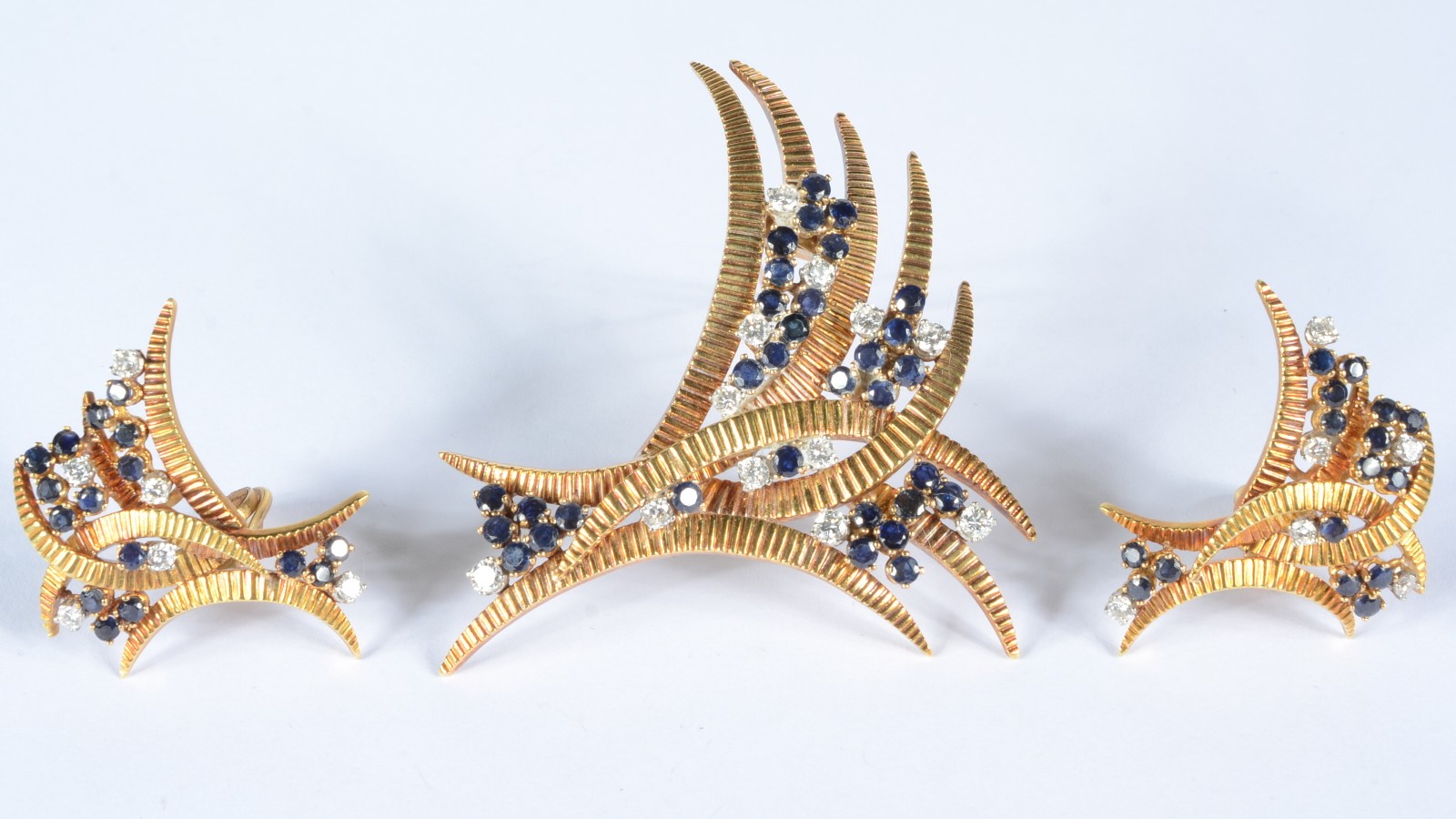 Conjunto de broche e par de brincos de ouro 18 k., contraste 750 mls... - foto 1 de 5