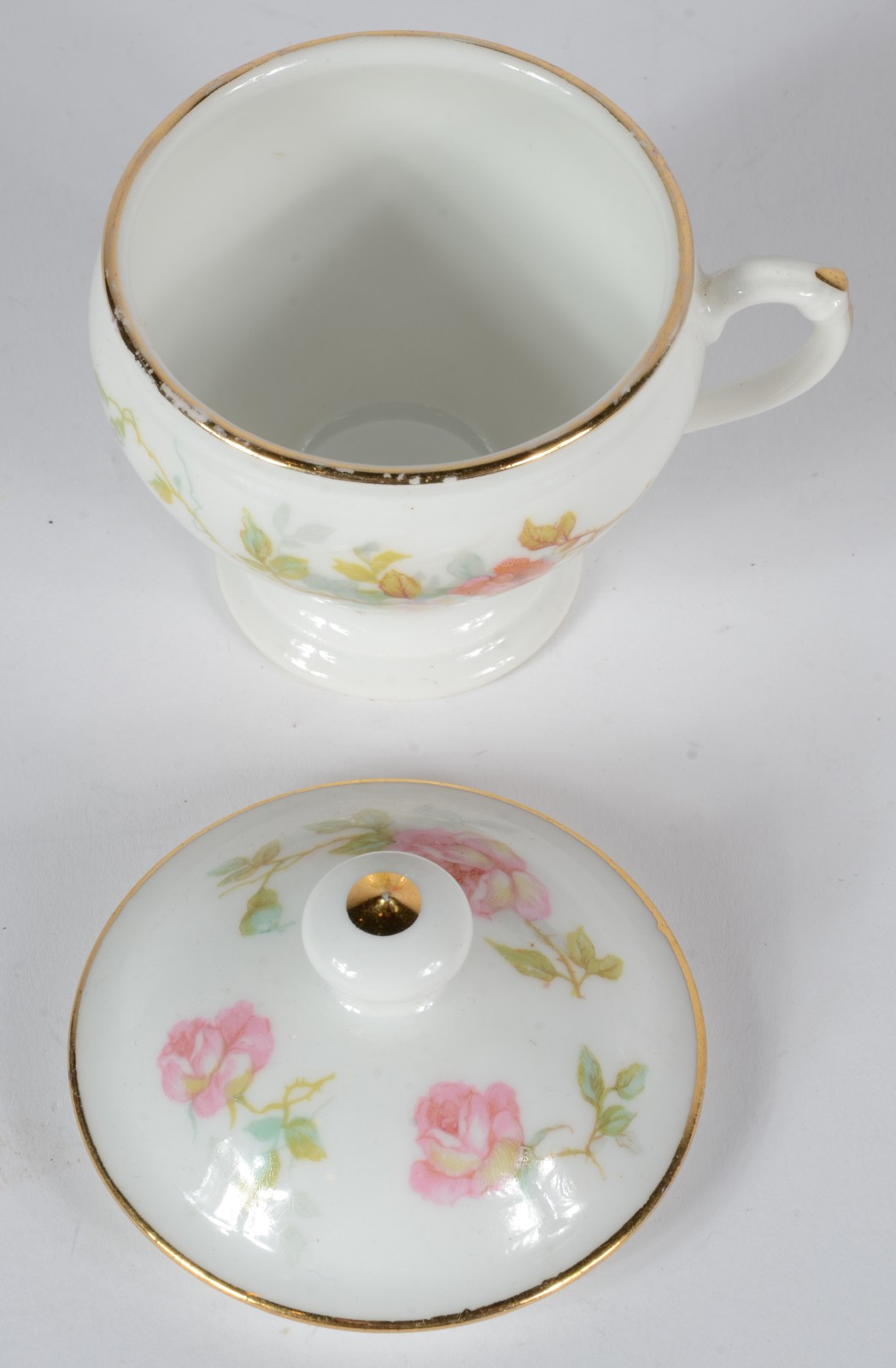 Conjunto com 10 cremeiras de porcelana francesa, decoração floral em... - foto 5 de 6