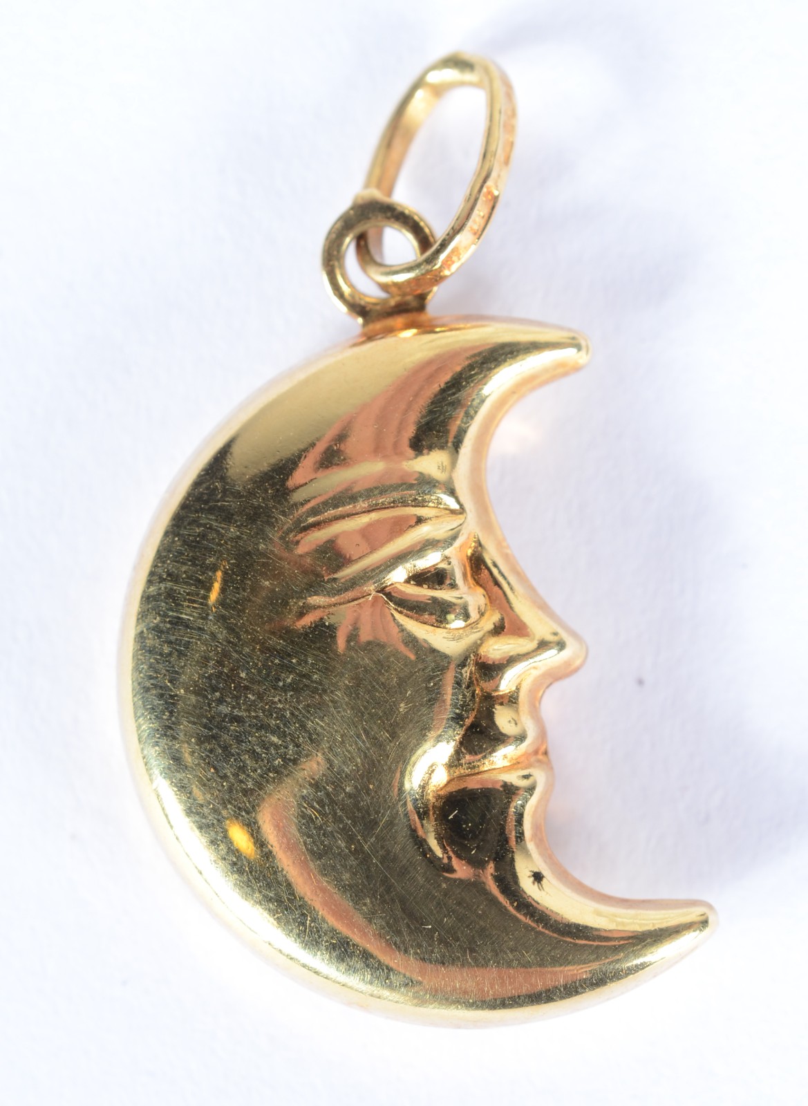 Pendente na forma meia lua de ouro 18 k. (Por motivos de segurança a... - foto 2 de 3