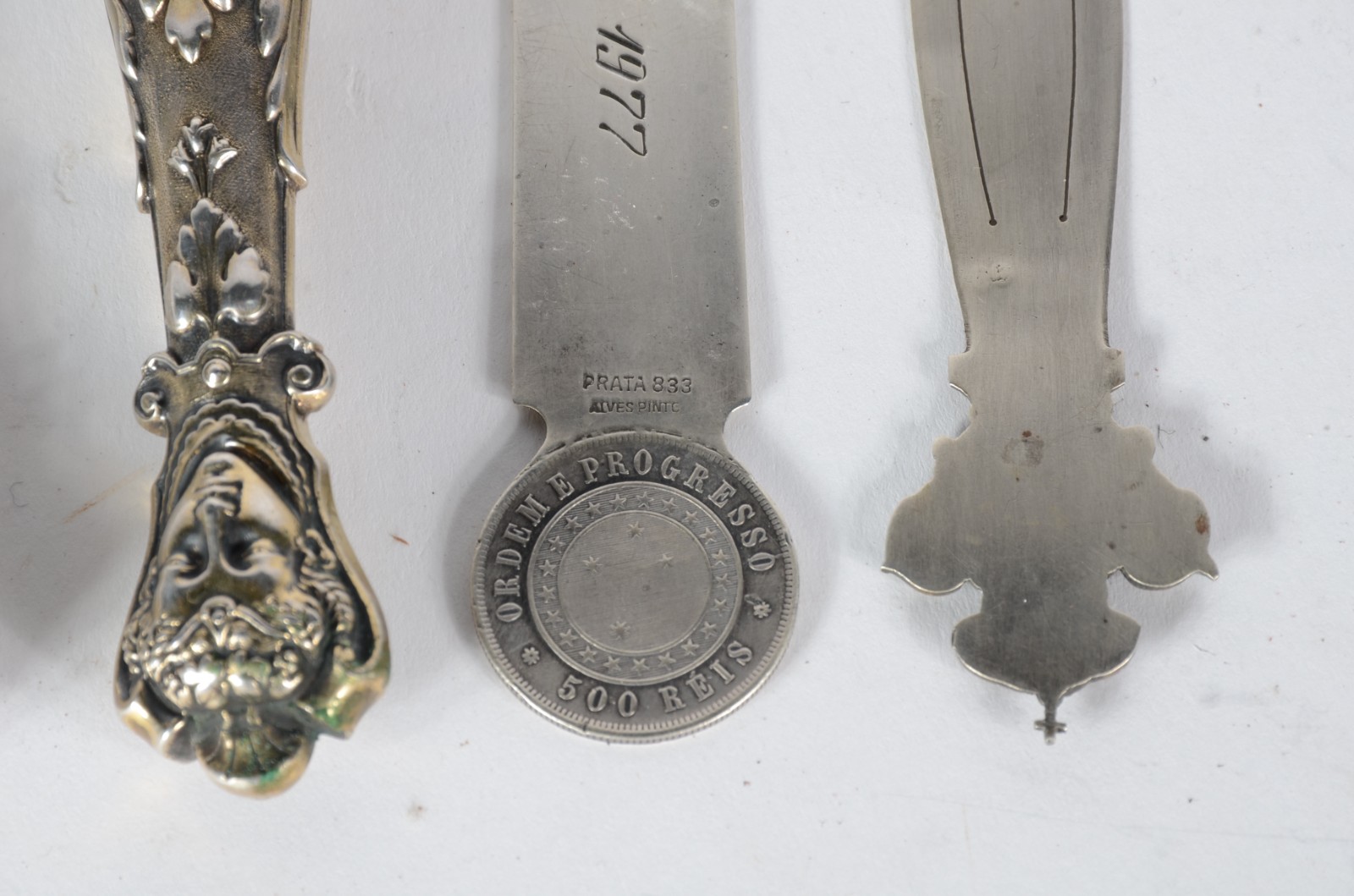 Diversas peças pequenas de prata, sendo: isqueiro, dois marcadores de... - foto 7 de 7