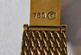 AUDEMARS PIGUET,  - Relógio masculino de ouro 18 k., marca suíça Audemar Piguet, mostrador com algarismos romanos sobre fundo preto. Mostrador medindo 2,00 x 2,20 cm. No 