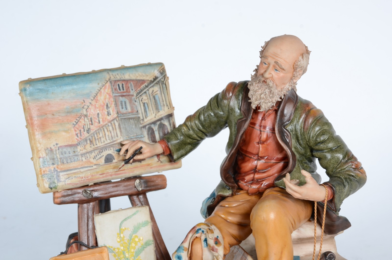 Grupo escultórico de faiança italiana representando artista pintando. - foto 2 de 7