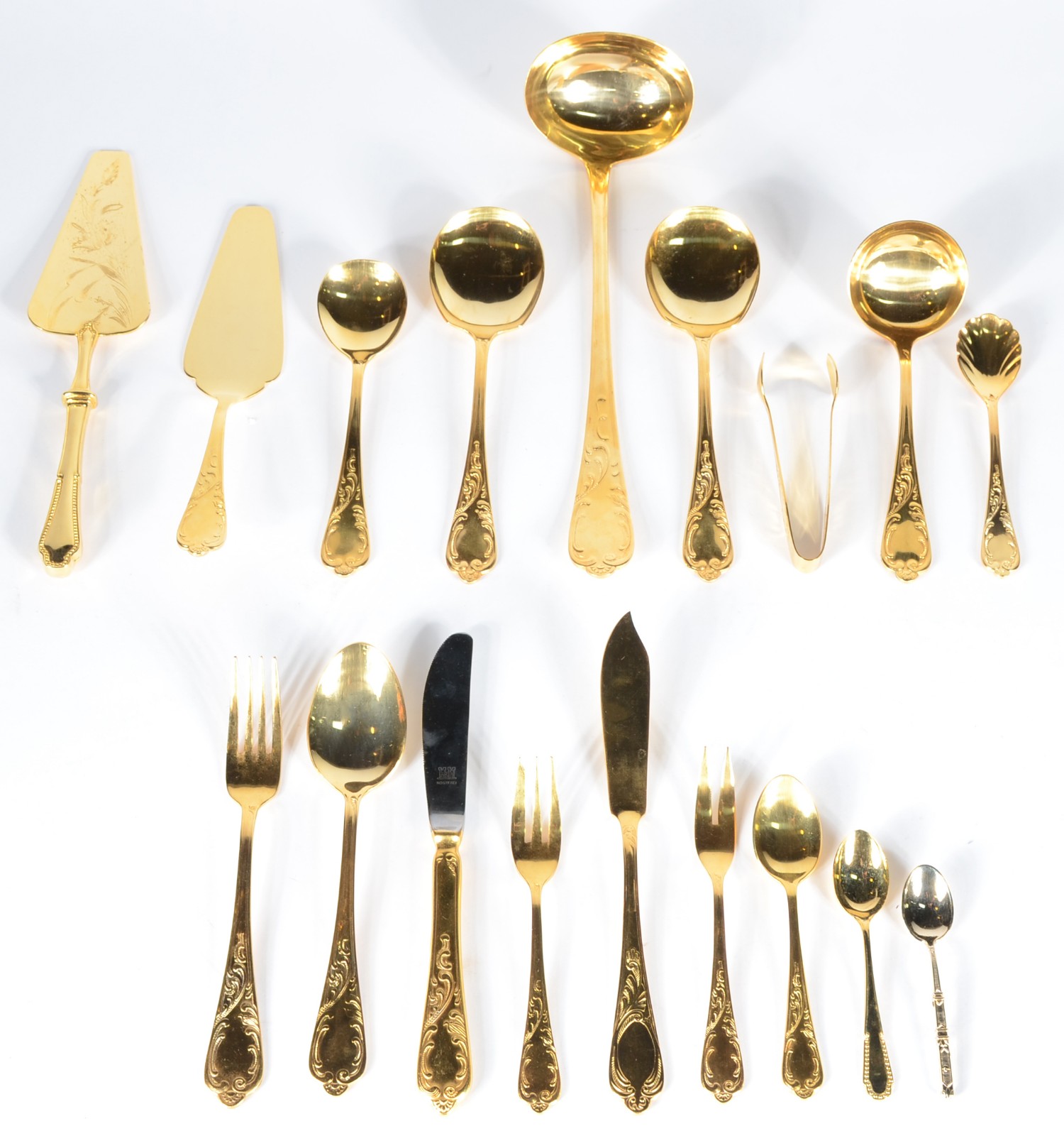 Faqueiro "Solingen" alemão de metal dourado, composto: 12 garfos, 12... - foto 1 de 9