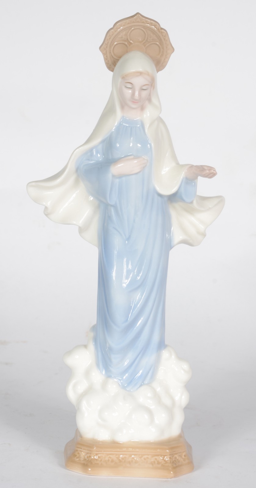 Escultura de porcelana policromada representando Nossa Senhora. - foto 1 de 5