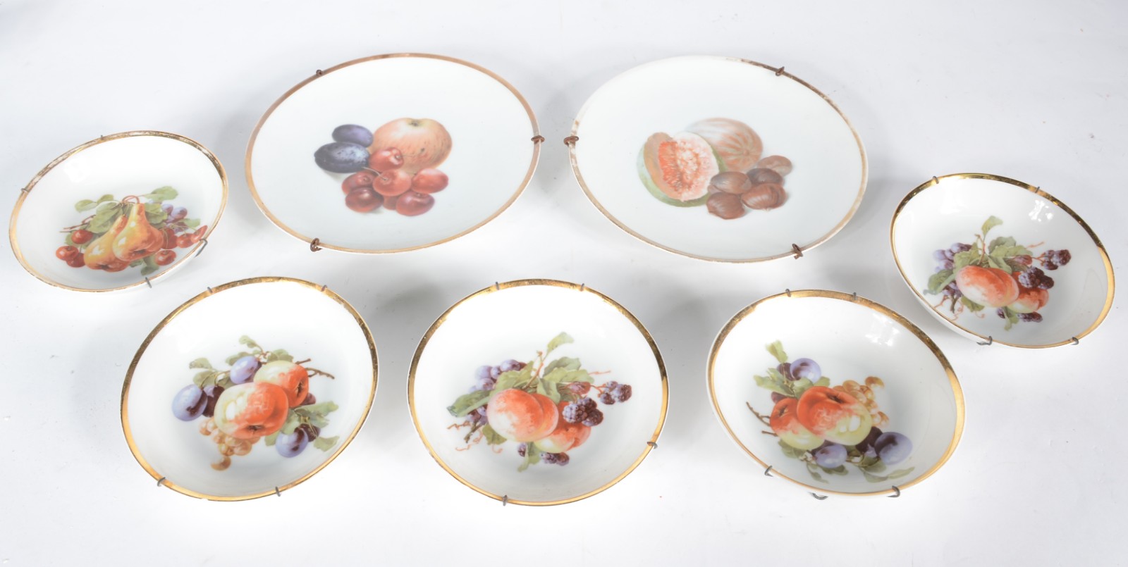 Conjunto para sobremesa de porcelana alemã, sendo: dois pratos... - foto 1 de 7