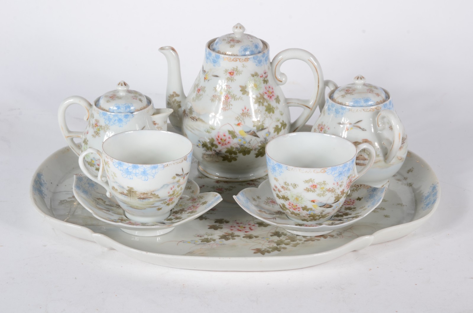 Tête a tête de porcelana japonesa, composto de: 2 xícaras pires... - foto 1 de 6