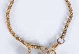 Pulseira de ouro 18 k., com pendentes, sendo um... - Pulseira de ouro 18 k., com pendentes, sendo um na forma de coração e outro feitio quadrado com estrela central e brilhante. (Por motivos de seg...