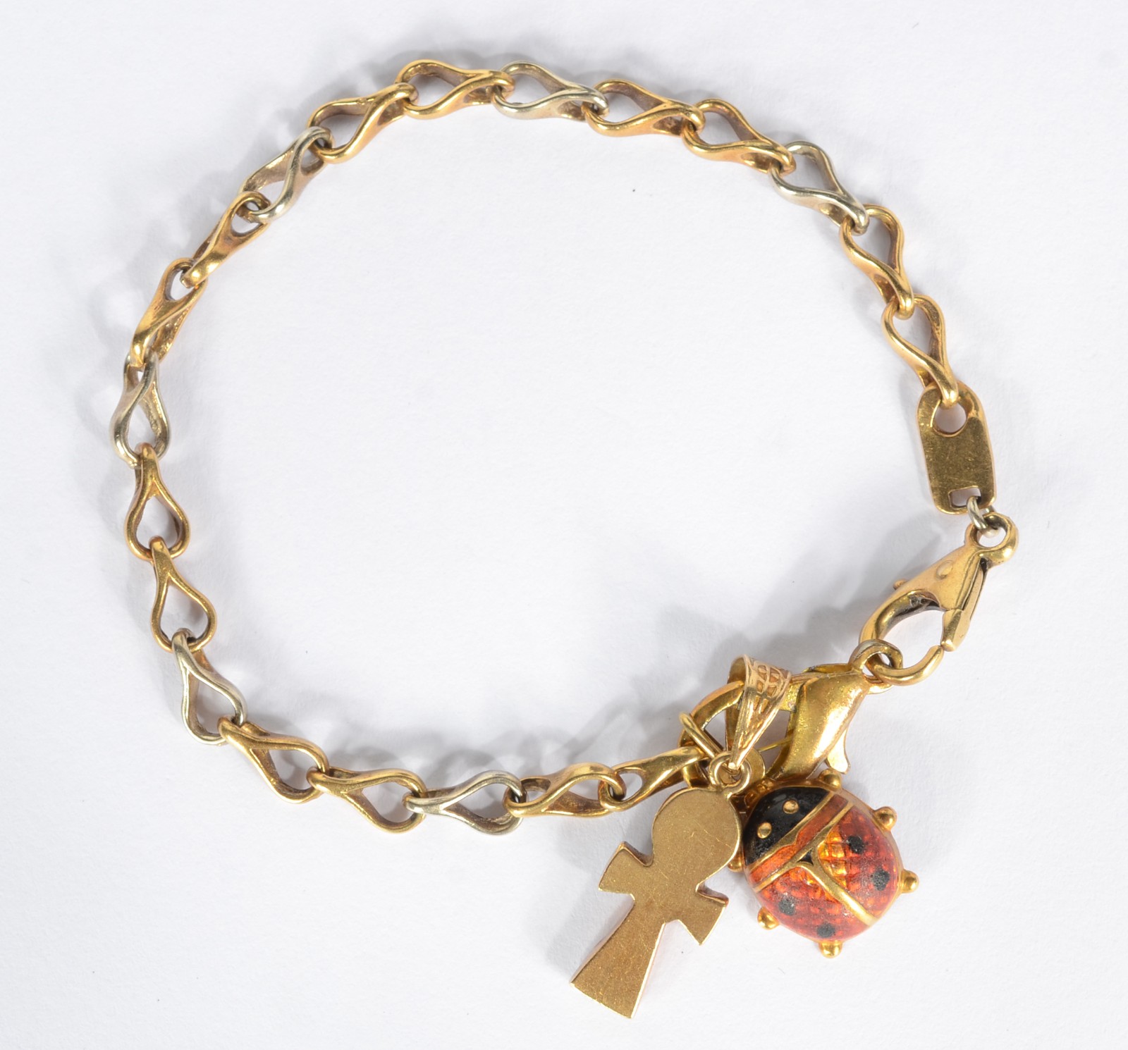 Pulseira de ouro 18k., contraste 750 mls com pendentes na forma de... - foto 2 de 6