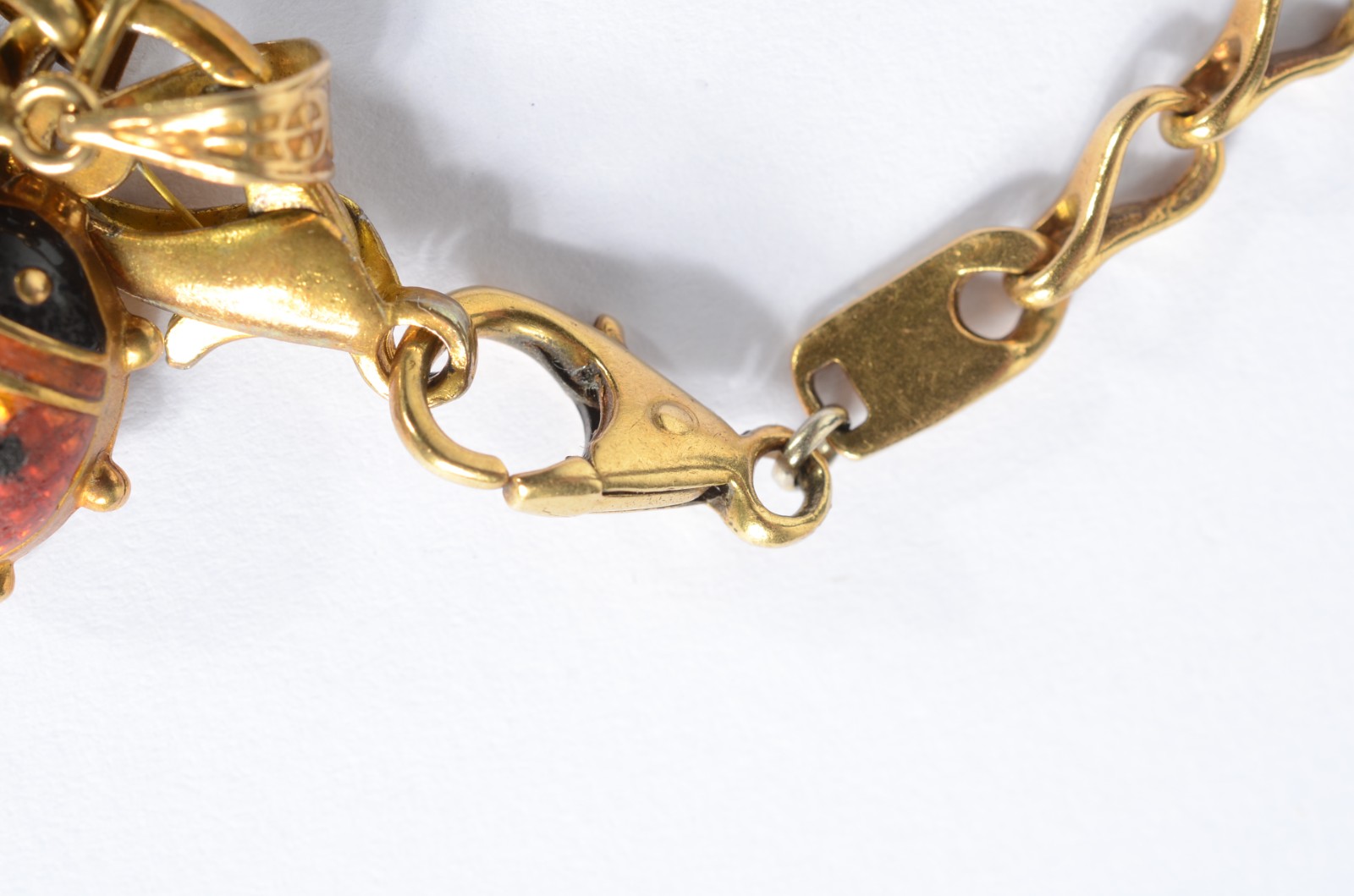 Pulseira de ouro 18k., contraste 750 mls com pendentes na forma de... - foto 5 de 6
