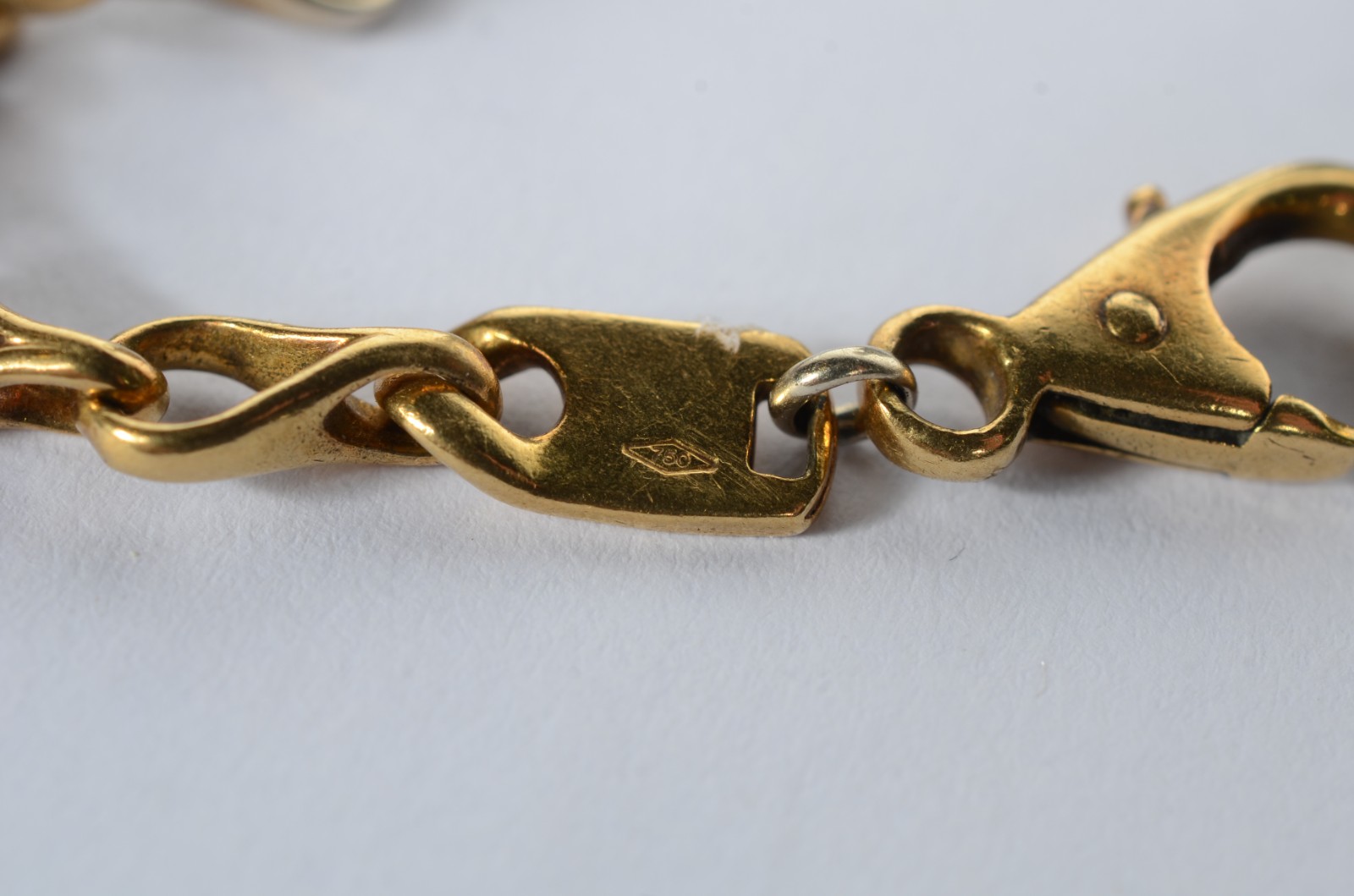 Pulseira de ouro 18k., contraste 750 mls com pendentes na forma de... - foto 6 de 6