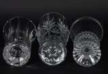 Três vasos diversos de cristal europeu lapidado. - Três vasos diversos de cristal europeu lapidado.