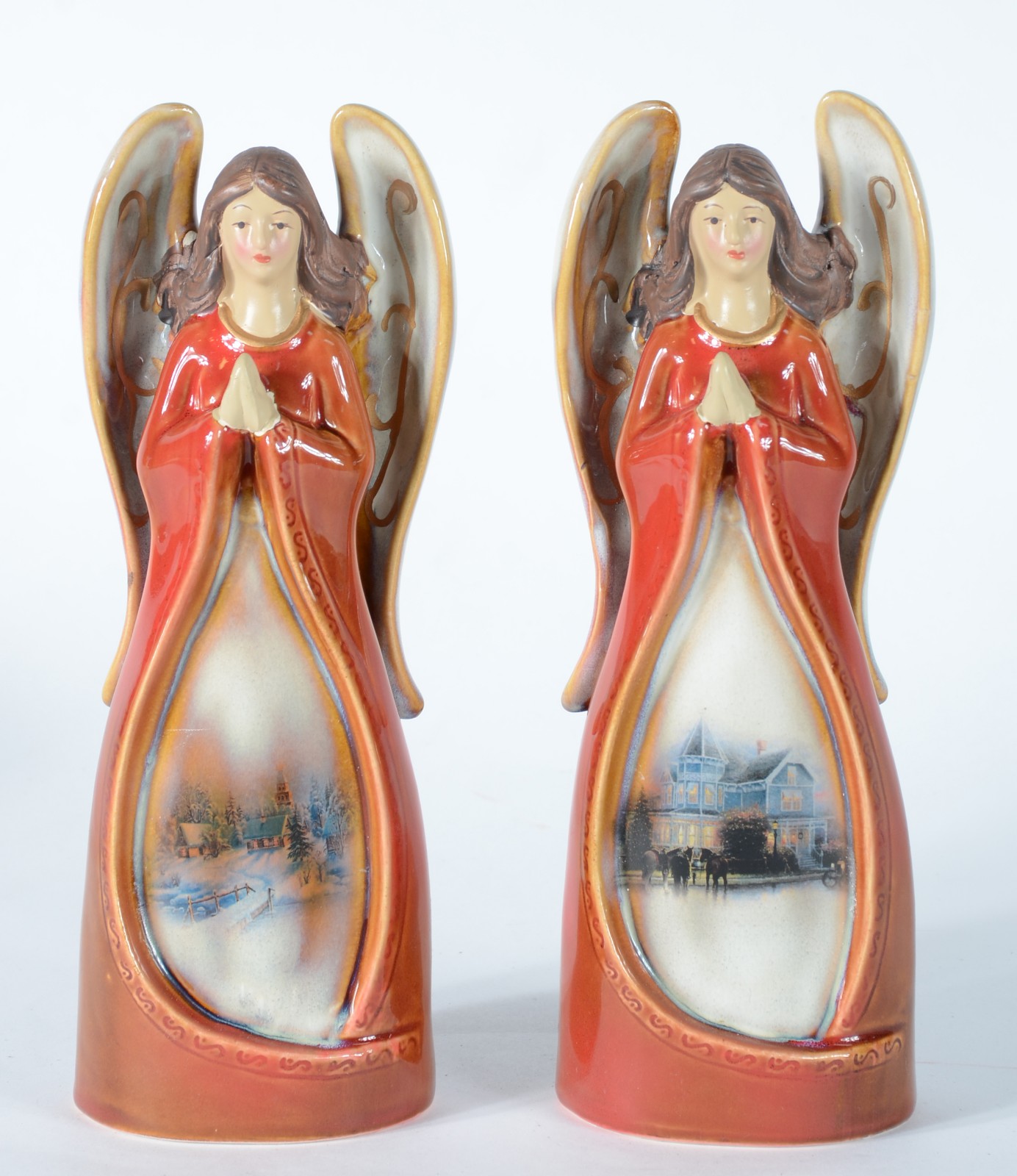 Duas esculturas de porcelana policromada representando anjos. - foto 2 de 5