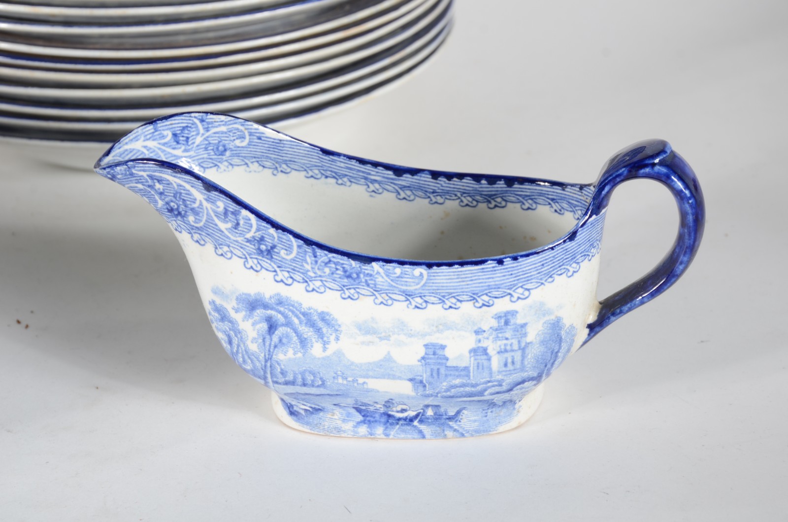 Serviço de jantar de faiança inglesa azul e branca, composto de: 14... - foto 5 de 11
