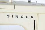 Singer,  - Máquina de costura modelo 974, na bolsa/estojo. Desgastes.