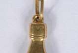 Gargantilha de ouro 18 k., contraste 750 mls co... - Gargantilha de ouro 18 k., contraste 750 mls com pendente na forma de figa. (Por motivos de segurança a peça não se encontra na loja).