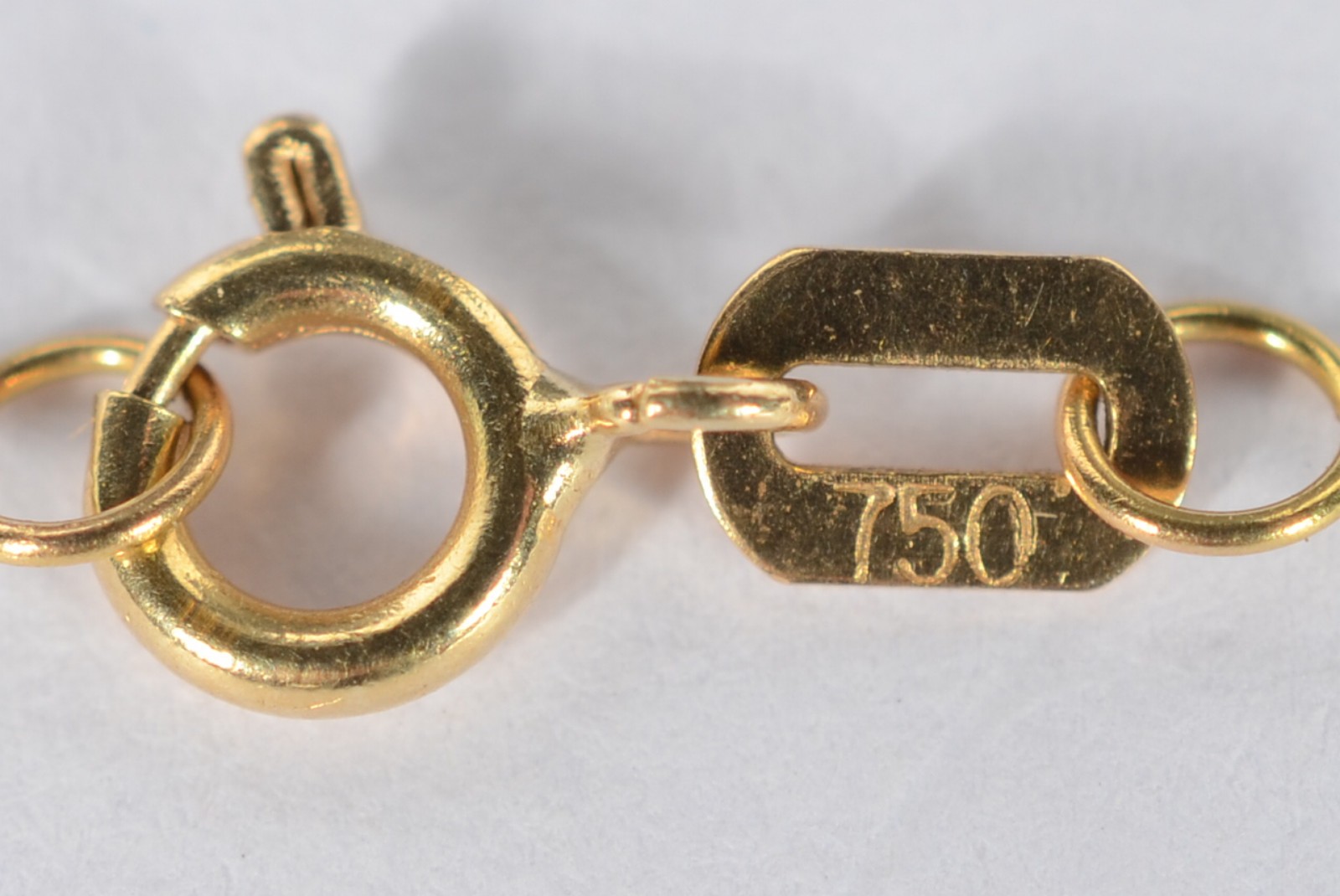 Colar de ouro 18 k., contraste 750 mls com ponto de luz de 0,90 ct... - foto 4 de 6
