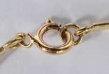 Pulseira "escrava" de ouro 18 k., contraste 750... - Pulseira "escrava" de ouro 18 k., contraste 750 mls com três brilhantes de aproximadamente 0,30 ct. (Por motivos de segurança a peça não se enco...