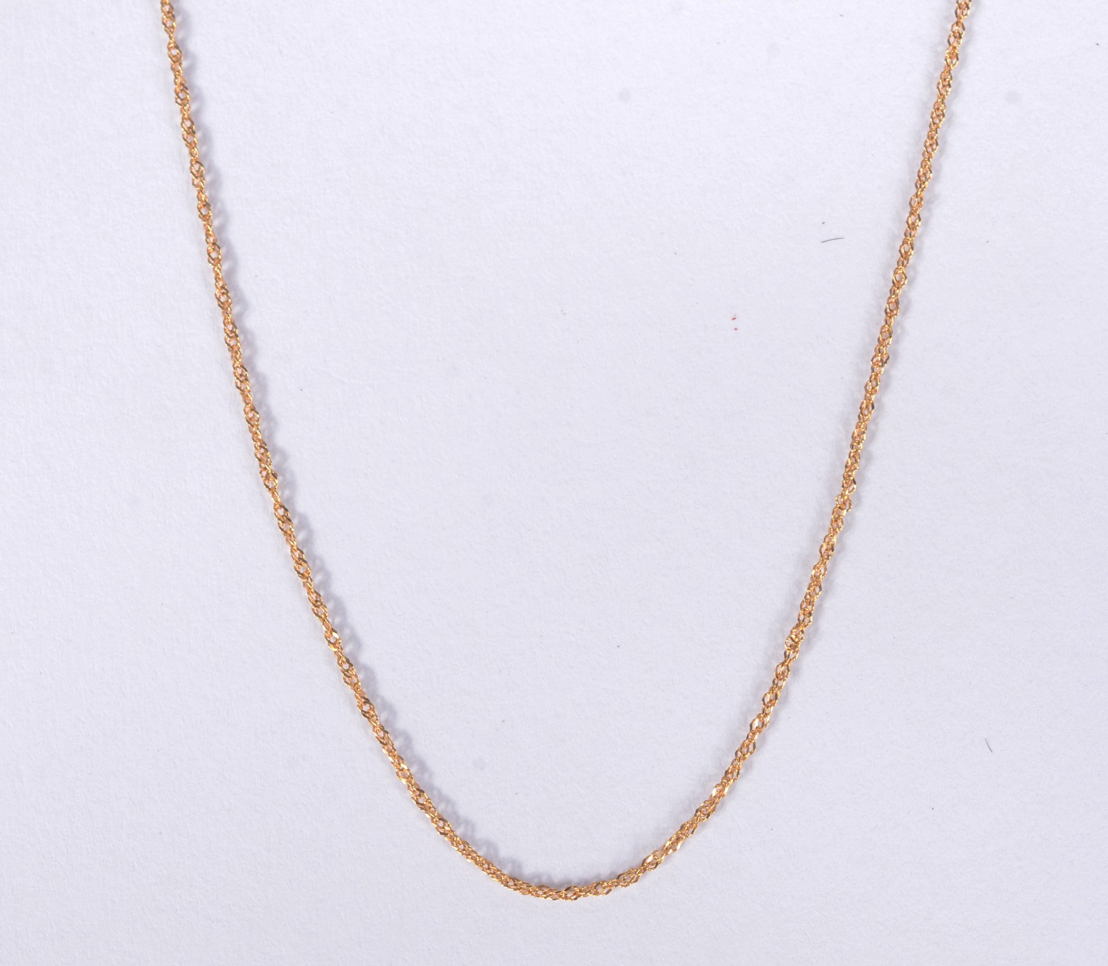Colar de ouro 18 k., contraste 750 mls feitio malha torcida. (Por... - foto 1 de 5