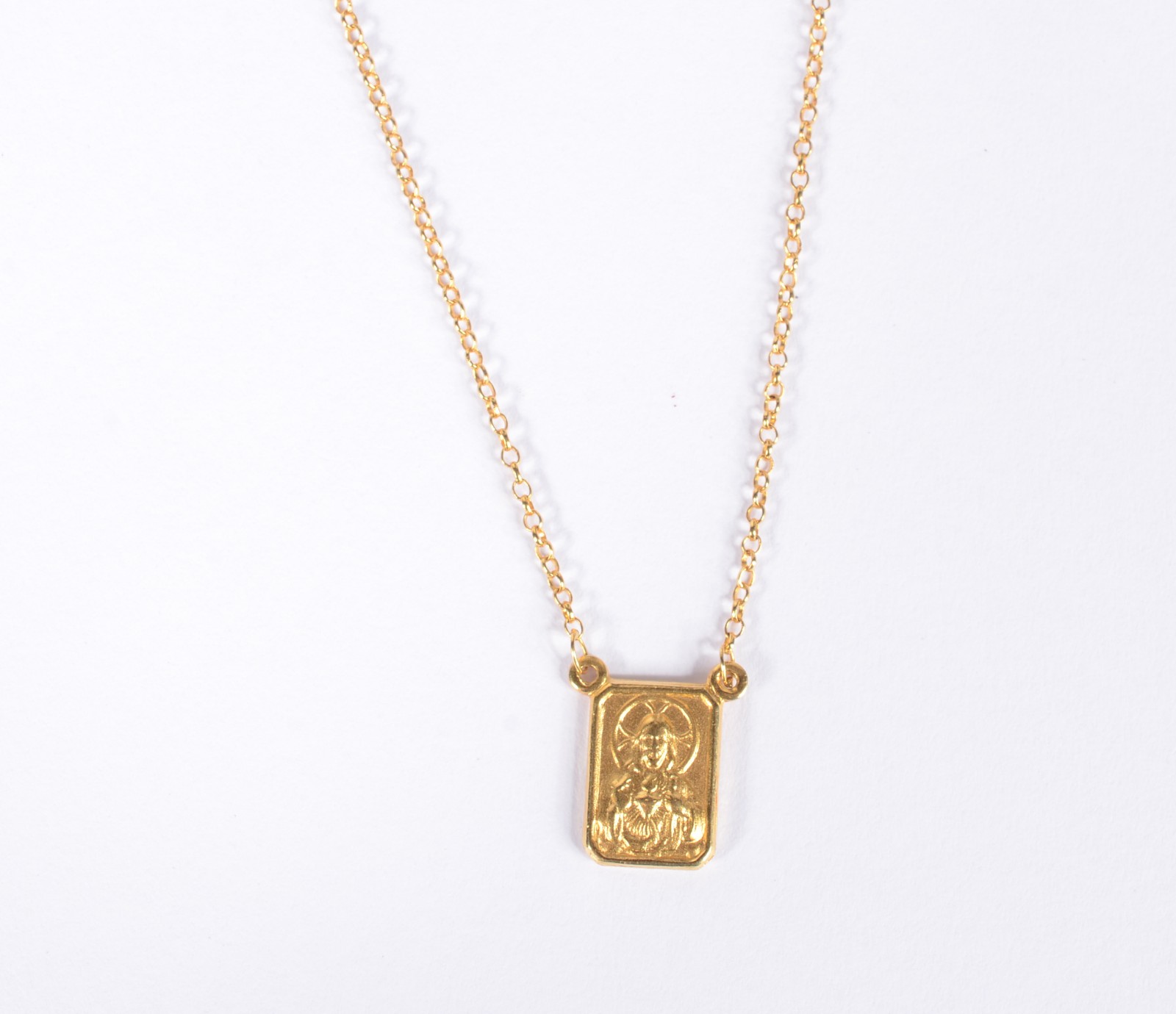 Colar (escapulário) de ouro 18 k. (Por motivos de segurança a peça... - foto 3 de 9