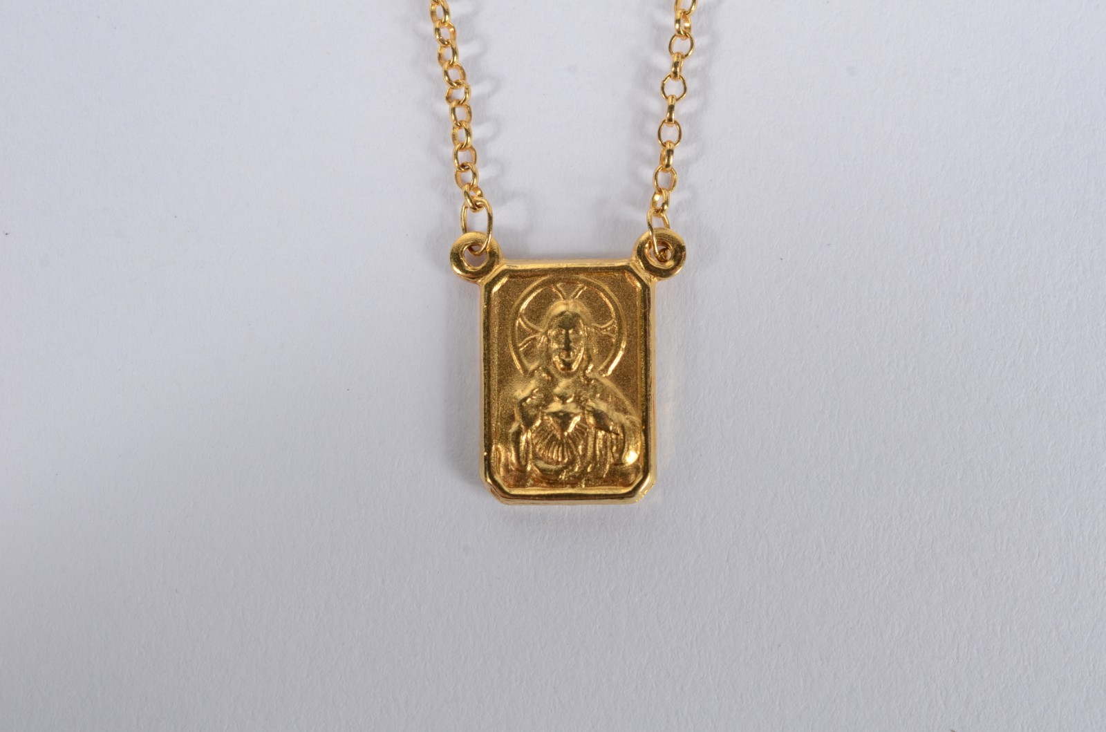 Colar (escapulário) de ouro 18 k. (Por motivos de segurança a peça... - foto 5 de 9