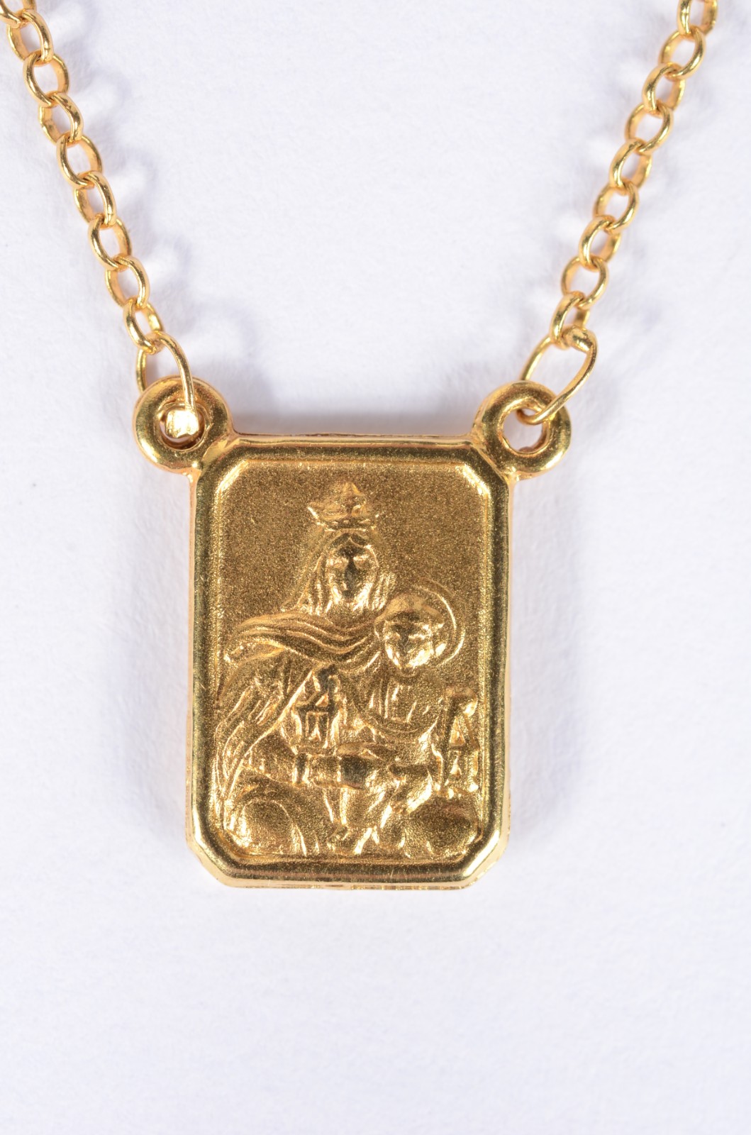Colar (escapulário) de ouro 18 k. (Por motivos de segurança a peça... - foto 6 de 9