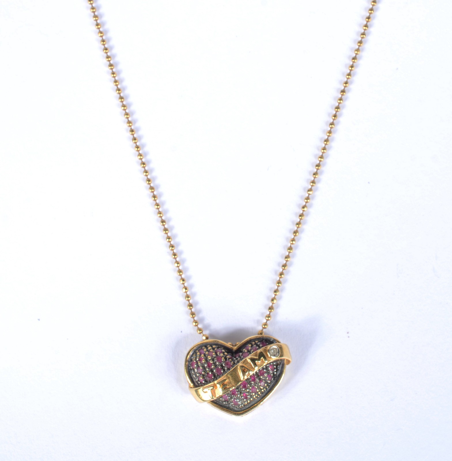 Colar com pendente na forma de coração com inscrição "Te Amo" de ouro... - foto 1 de 7