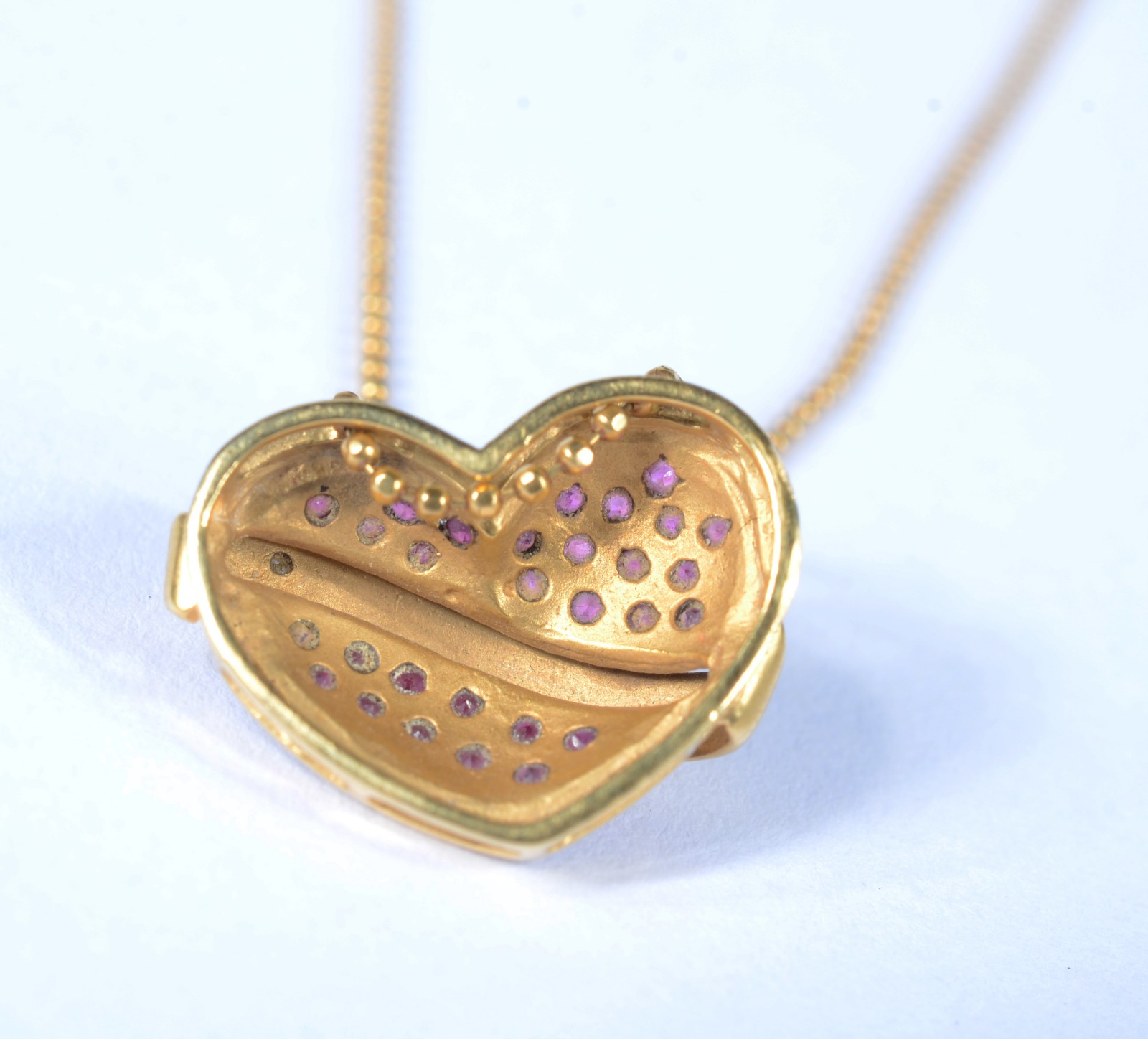 Colar com pendente na forma de coração com inscrição "Te Amo" de ouro... - foto 5 de 7