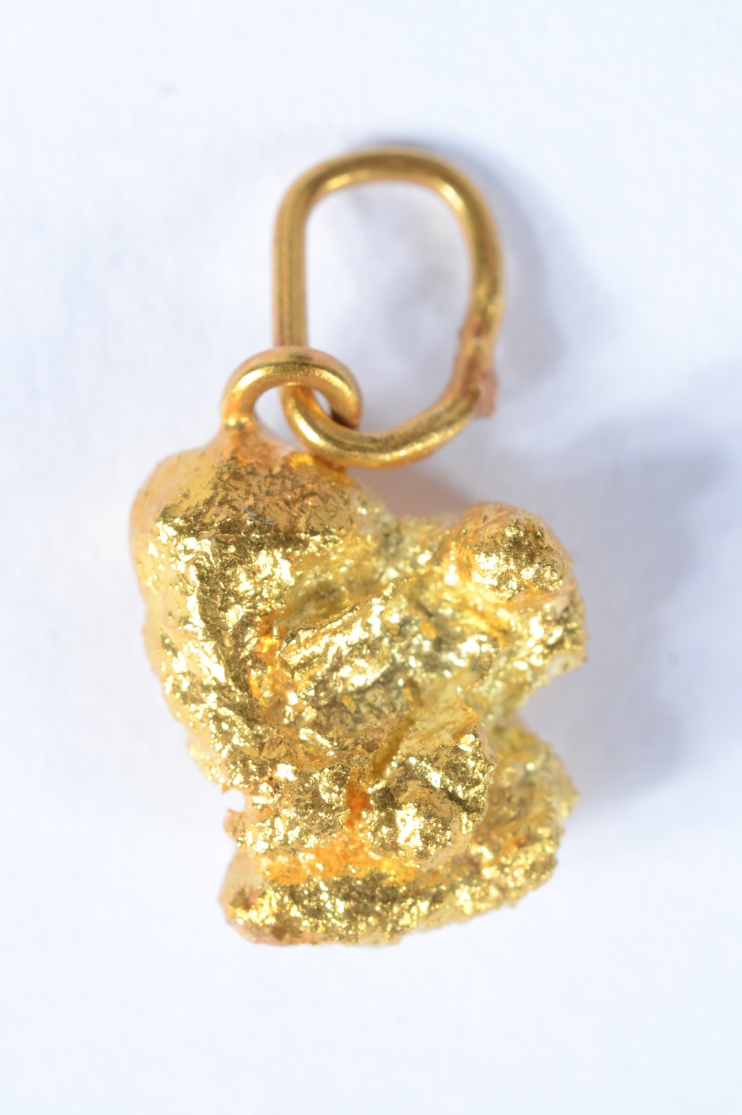 Pequena pepita de ouro 18 k. (Por motivos de segurança a peça não se... - foto 1 de 4