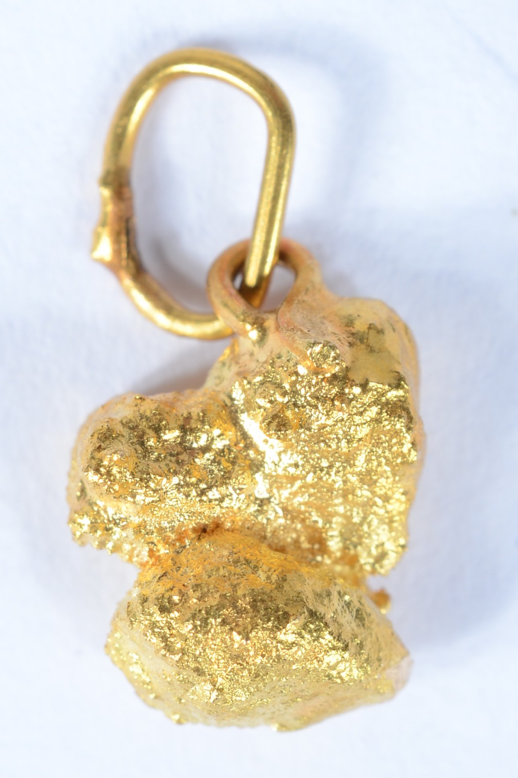 Pequena pepita de ouro 18 k. (Por motivos de segurança a peça não se... - foto 2 de 4