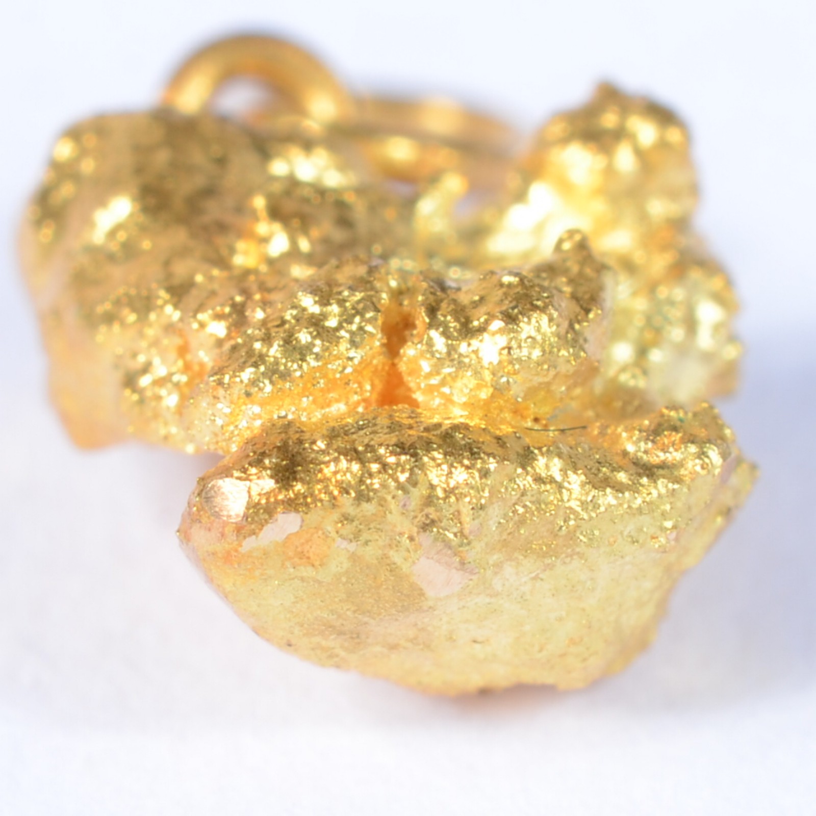 Pequena pepita de ouro 18 k. (Por motivos de segurança a peça não se... - foto 3 de 4