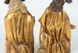 Presépio de madeira dourada e policromada, comp... - Presépio de madeira dourada e policromada, composto de Menino Jesus (com vestimenta em tecido), Maria e Jose (com resplendores).  Século XIX.