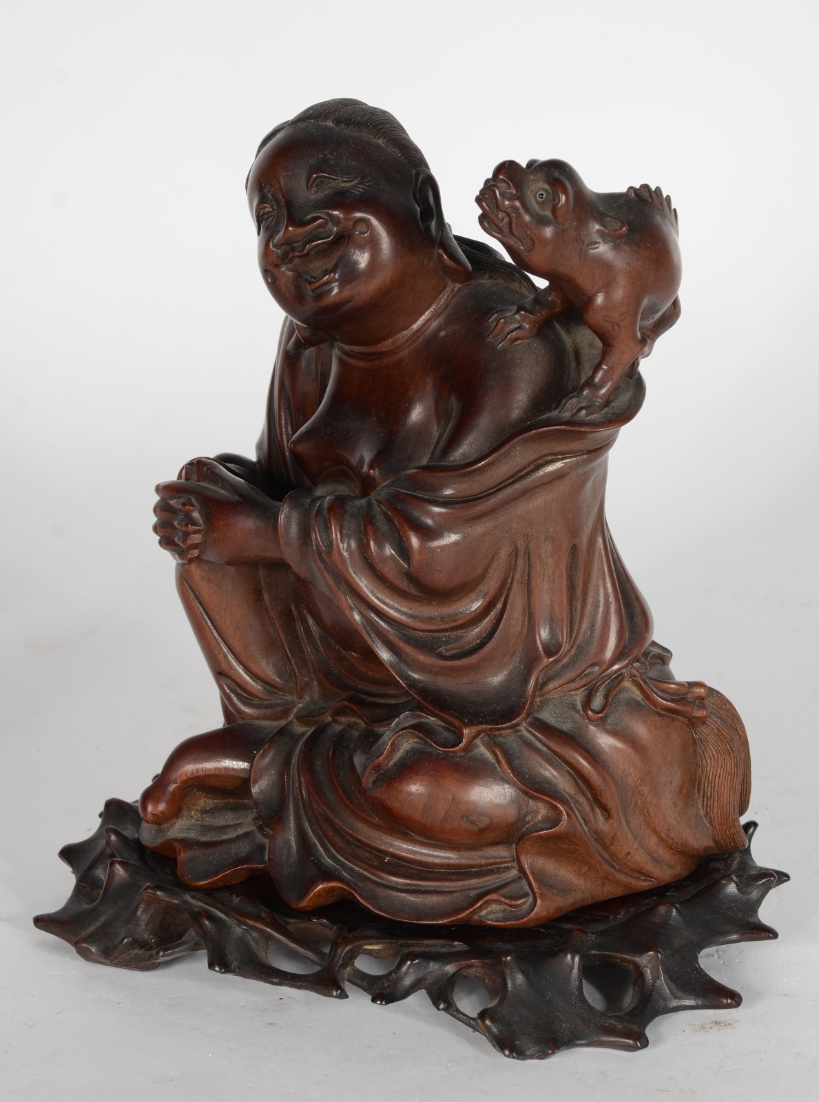 Grupo escultórico de madeira oriental representando figura de Buda... - foto 3 de 8