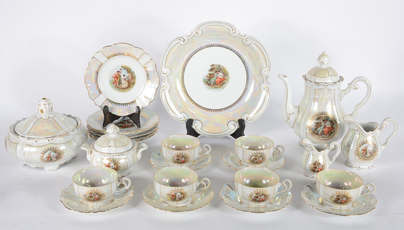 Serviço de chá de porcelana STP, composto de: 6 xícaras de chá com... - foto 1 de 5
