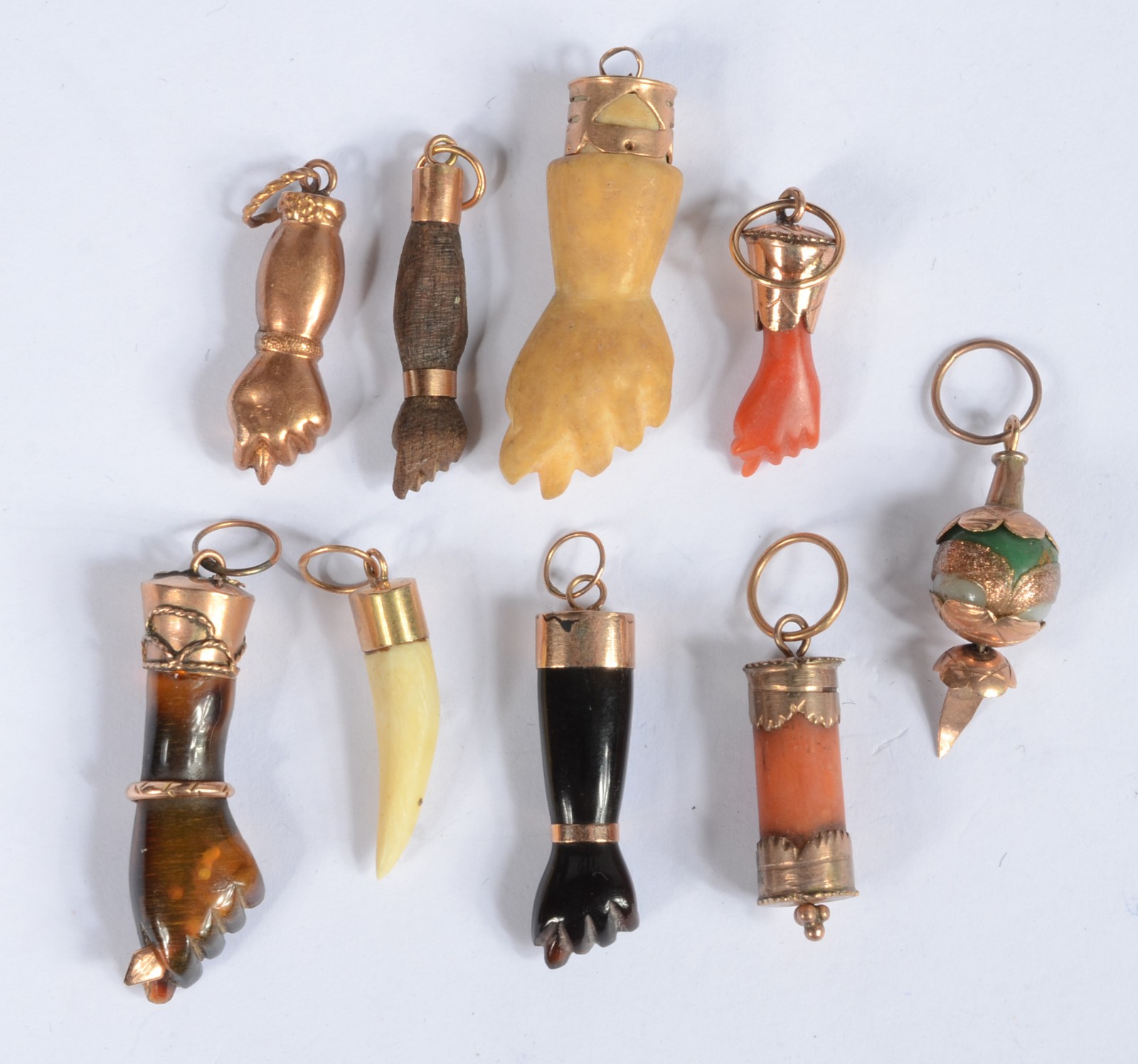 Joia de crioula - Conjunto com 9 figas diversas com detalhes em metal... - foto 1 de 2